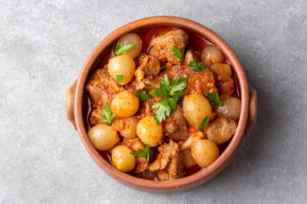 Traditional Greek dish of beef stifado in a sauce. Meat stew, onion stew. sogan yahni or et yahni